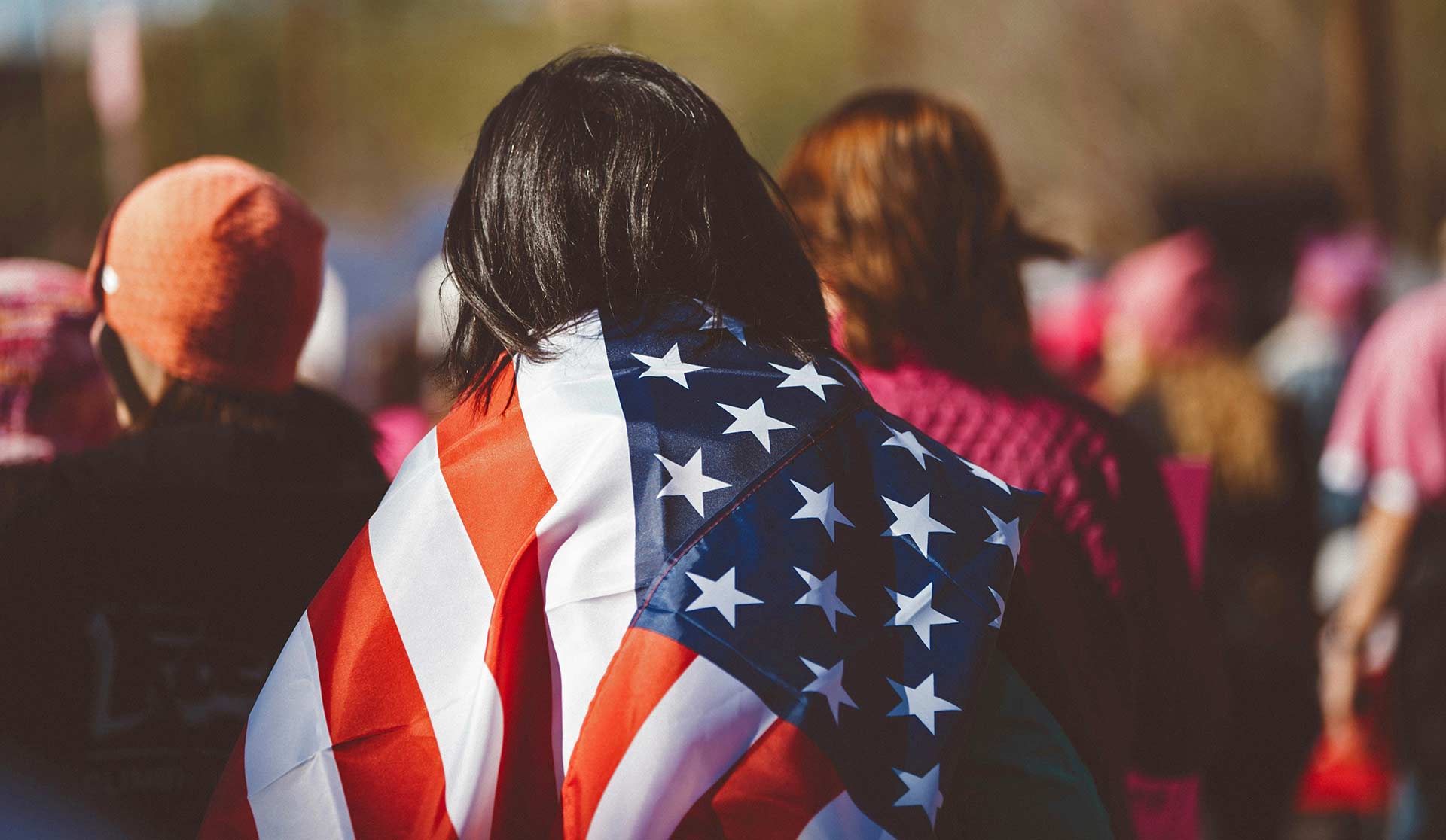 Person with Flag over their Back